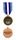A medal was established in January 1992 for which 90 days of service is required for qualification. The medal has five equal bars, the centre being white, flanked by dark blue, and, at either end, by UN blue. The dark blue and white represent the national flag of El Salvador.